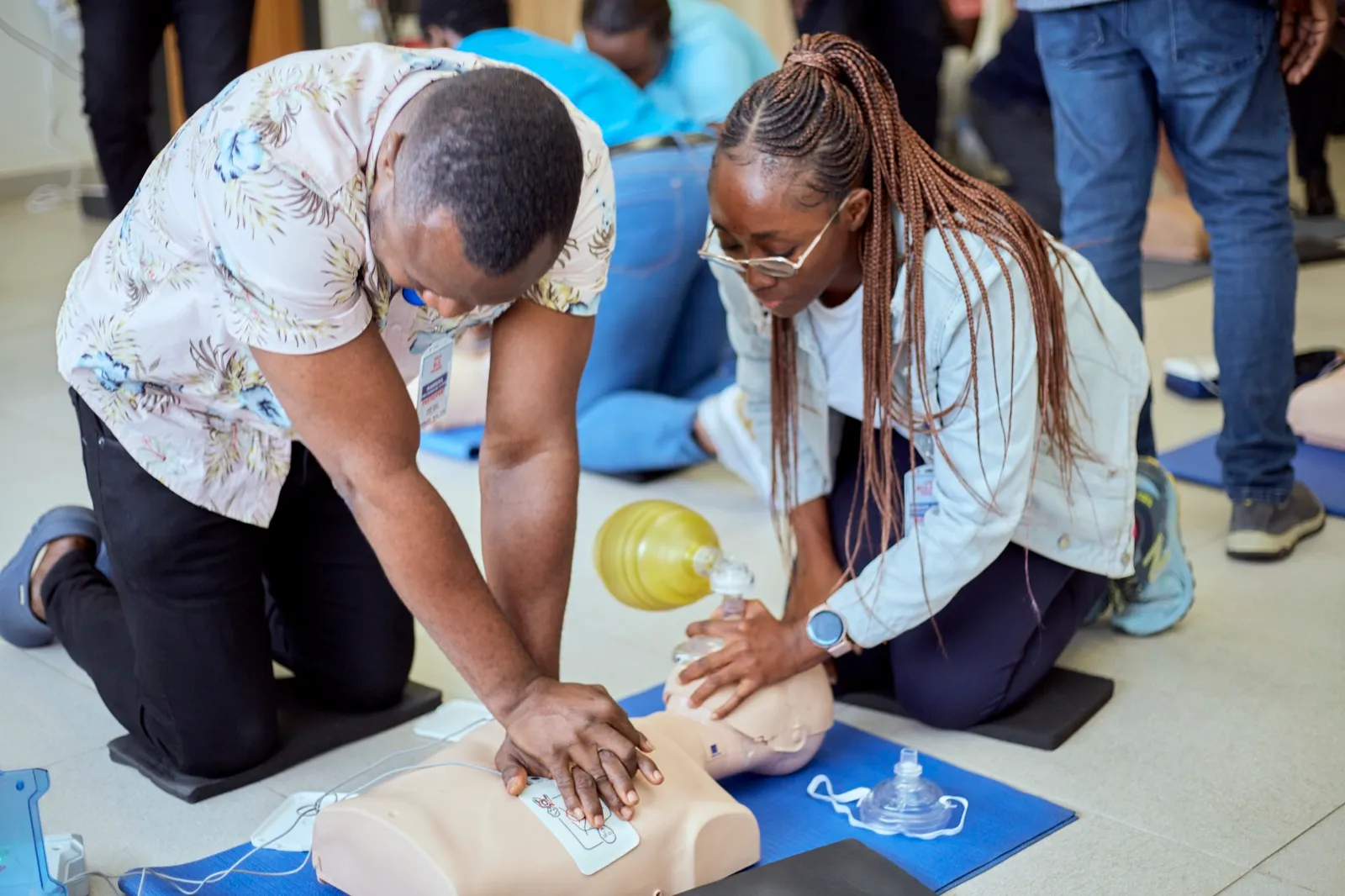 Healthcare team performing advanced resuscitation during an ACLS simulation